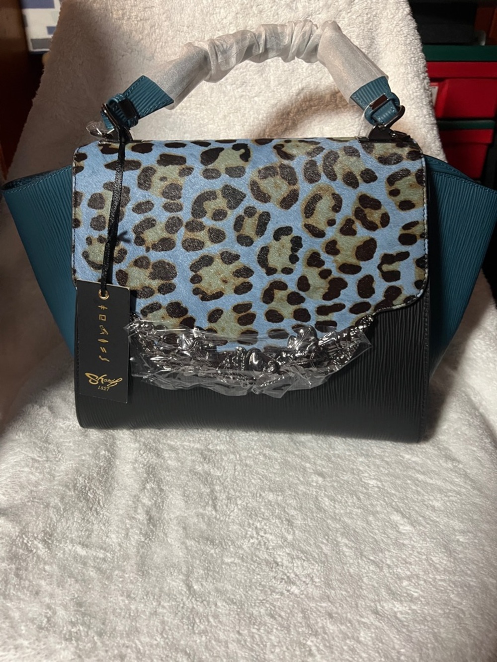 Sharif Handbag with Blue Leopard Print Flap and Teal Side Panels